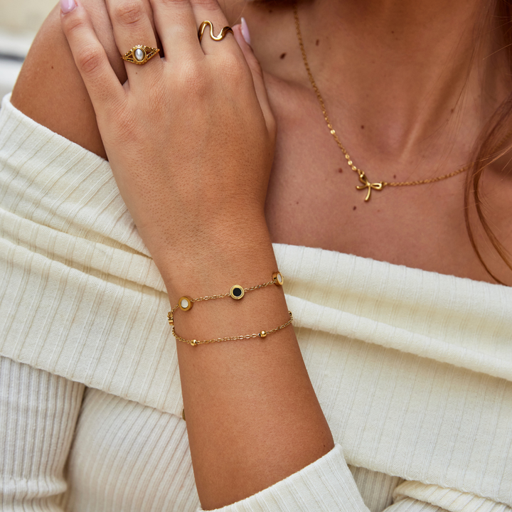 Pulsera con Ónix y Piedra Blanca