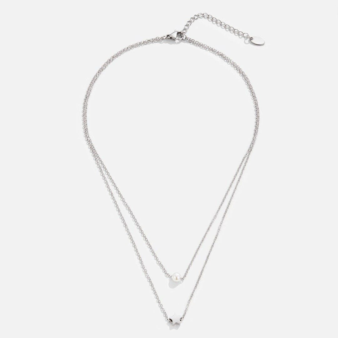 Collar en capas – Estrella de plata y perla elegante