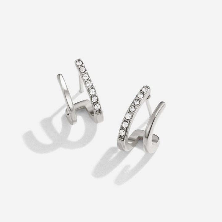 Pendientes Garra – Plata brillante con cristal elegante