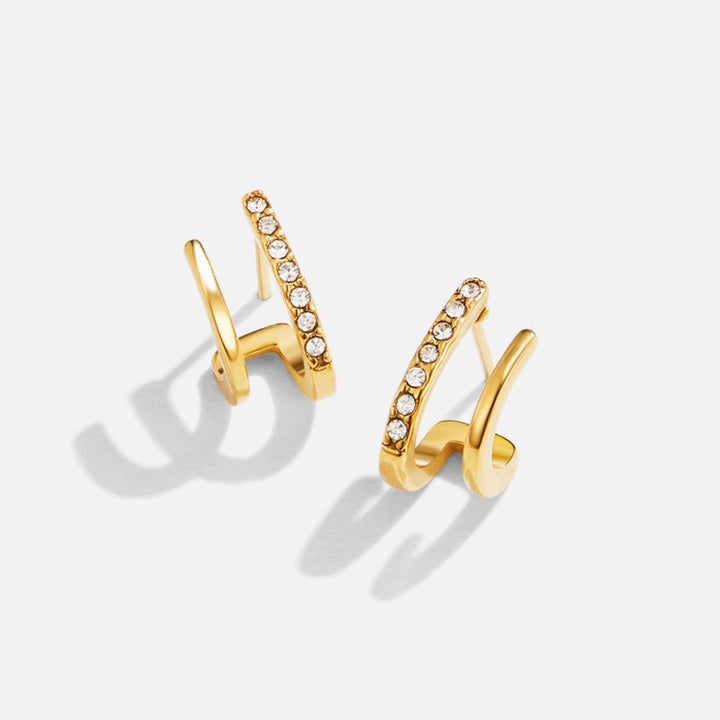 Pendientes garra – Oro y cristales brillantes