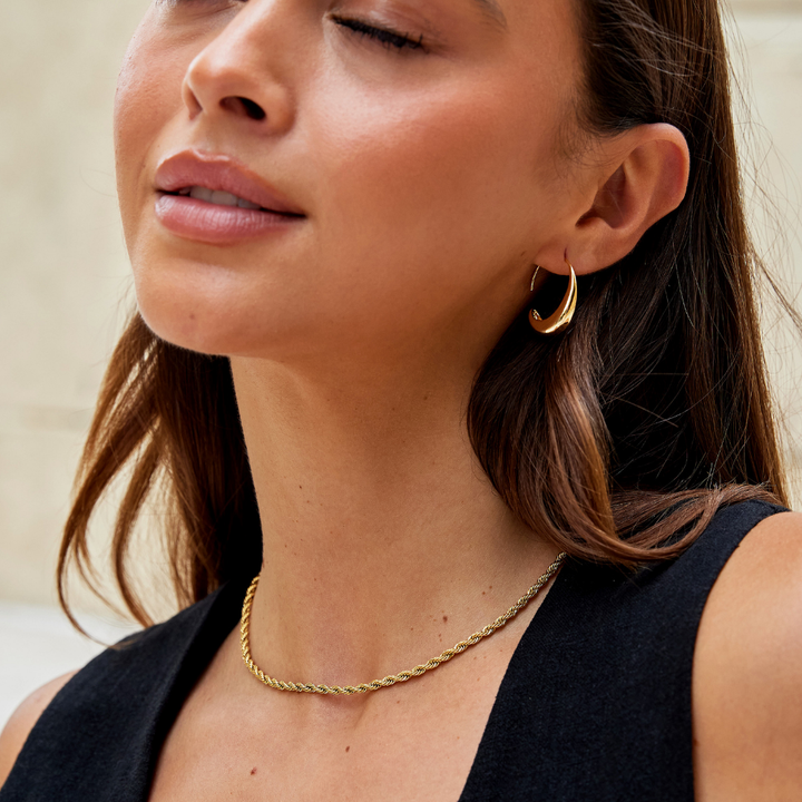 Cina – Aros con colgante en forma de gota