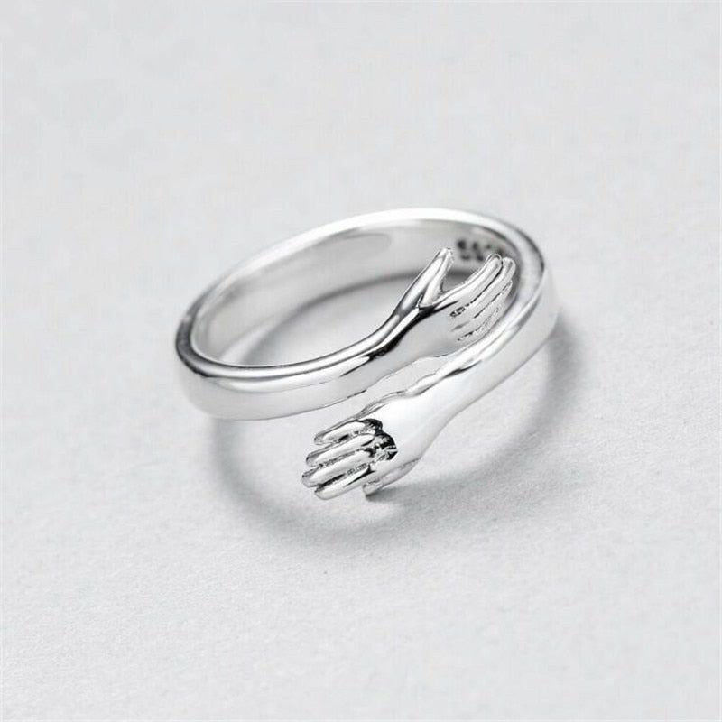 Diseño abrazo – Anillo ajustable en plata
