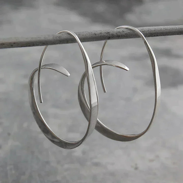 Diseño espiral – Pendientes elegantes y modernos