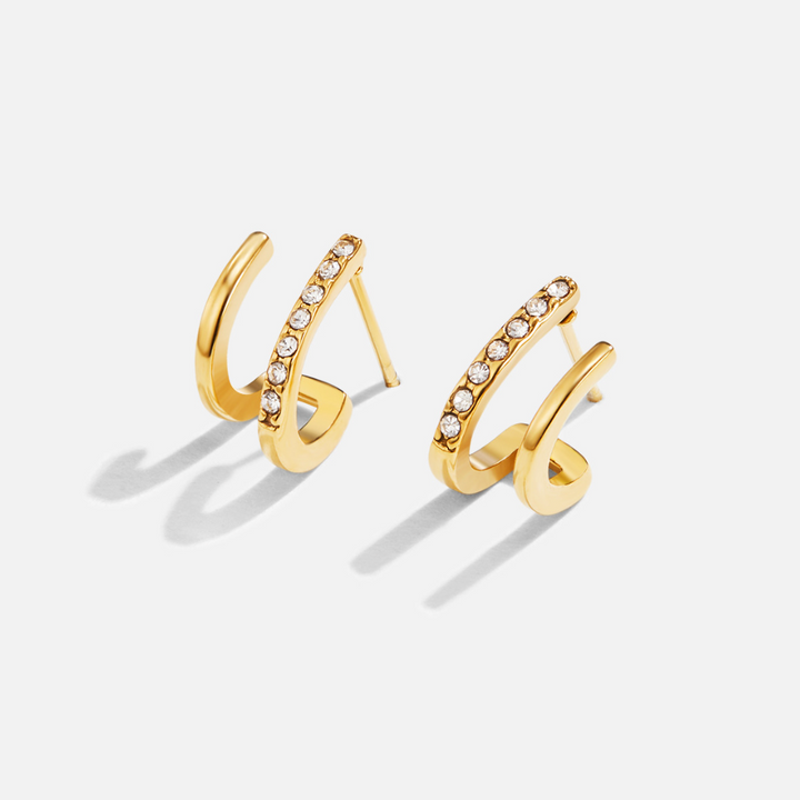 Pendientes garra – Oro y cristales brillantes