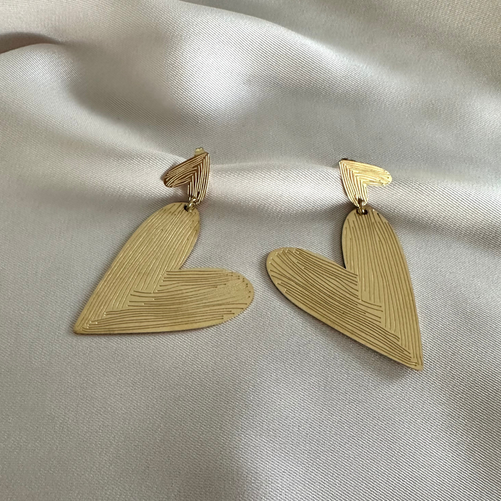 Cece – Pendientes largos dorados