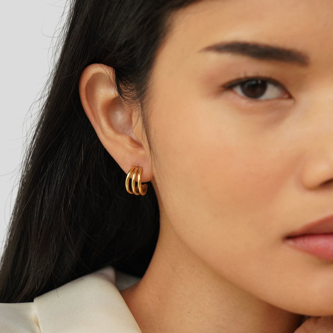 Ana – Pendientes triples dorados elegantes
