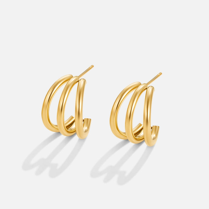 Ana – Pendientes triples dorados elegantes