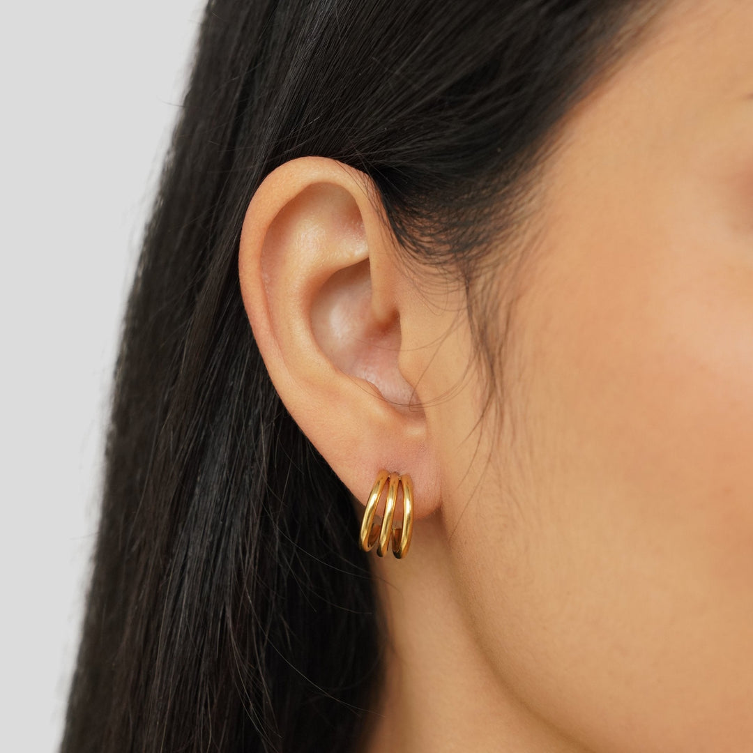 Ana – Pendientes triples dorados elegantes