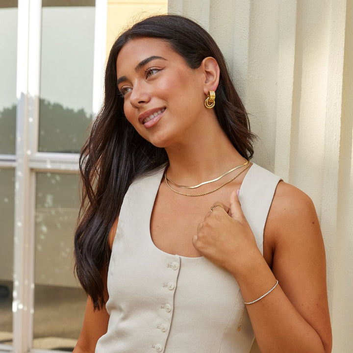 Lexi – Pendientes de aro dorados con diseño doble