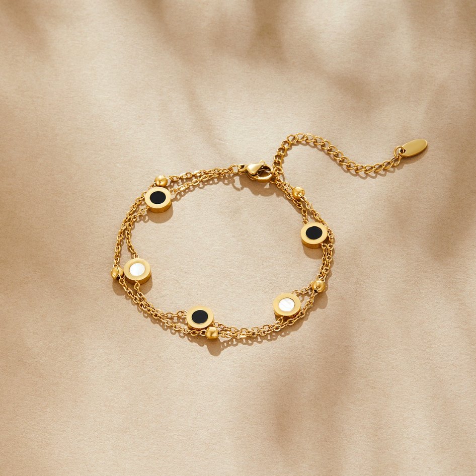 Pulsera con Ónix y Piedra Blanca