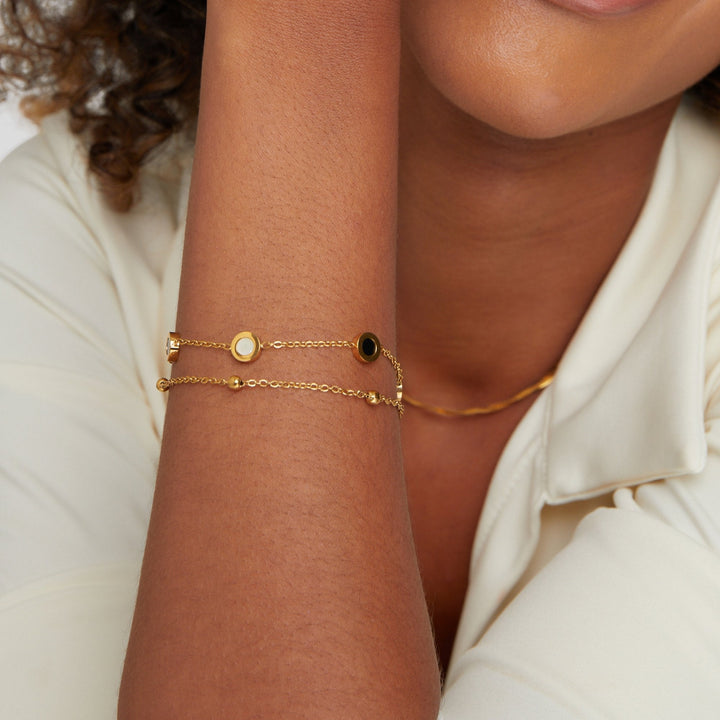 Pulsera con Ónix y Piedra Blanca