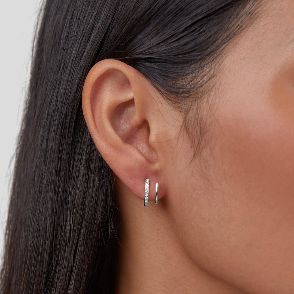 Pendientes Garra – Plata brillante con cristal elegante